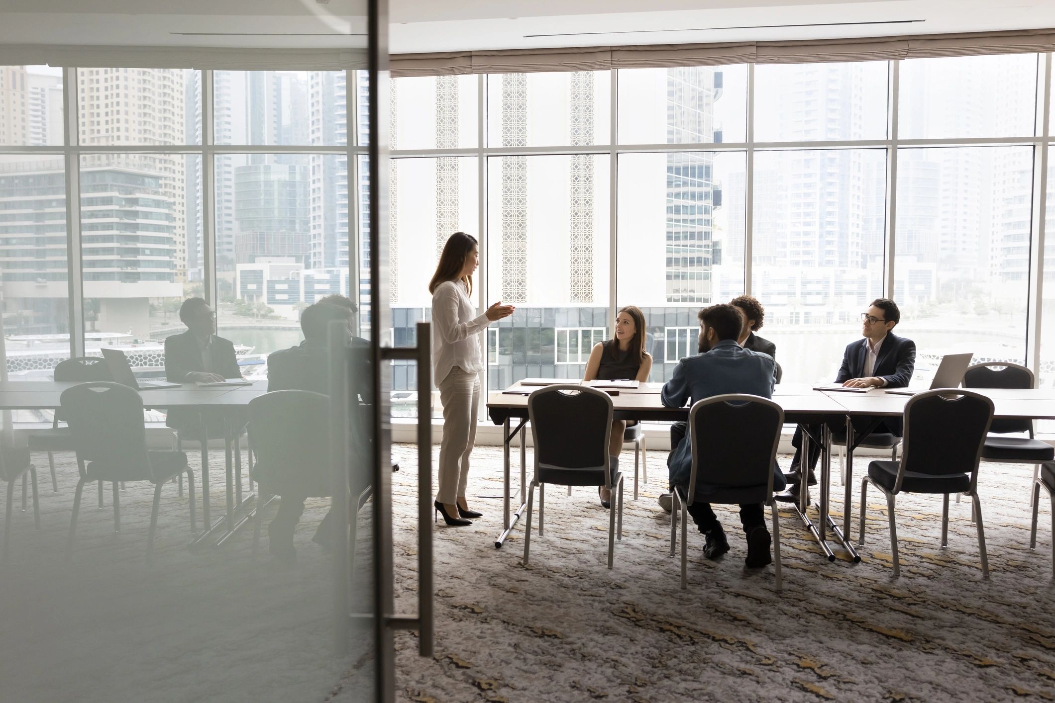 Executive consulting team meeting in a modern office