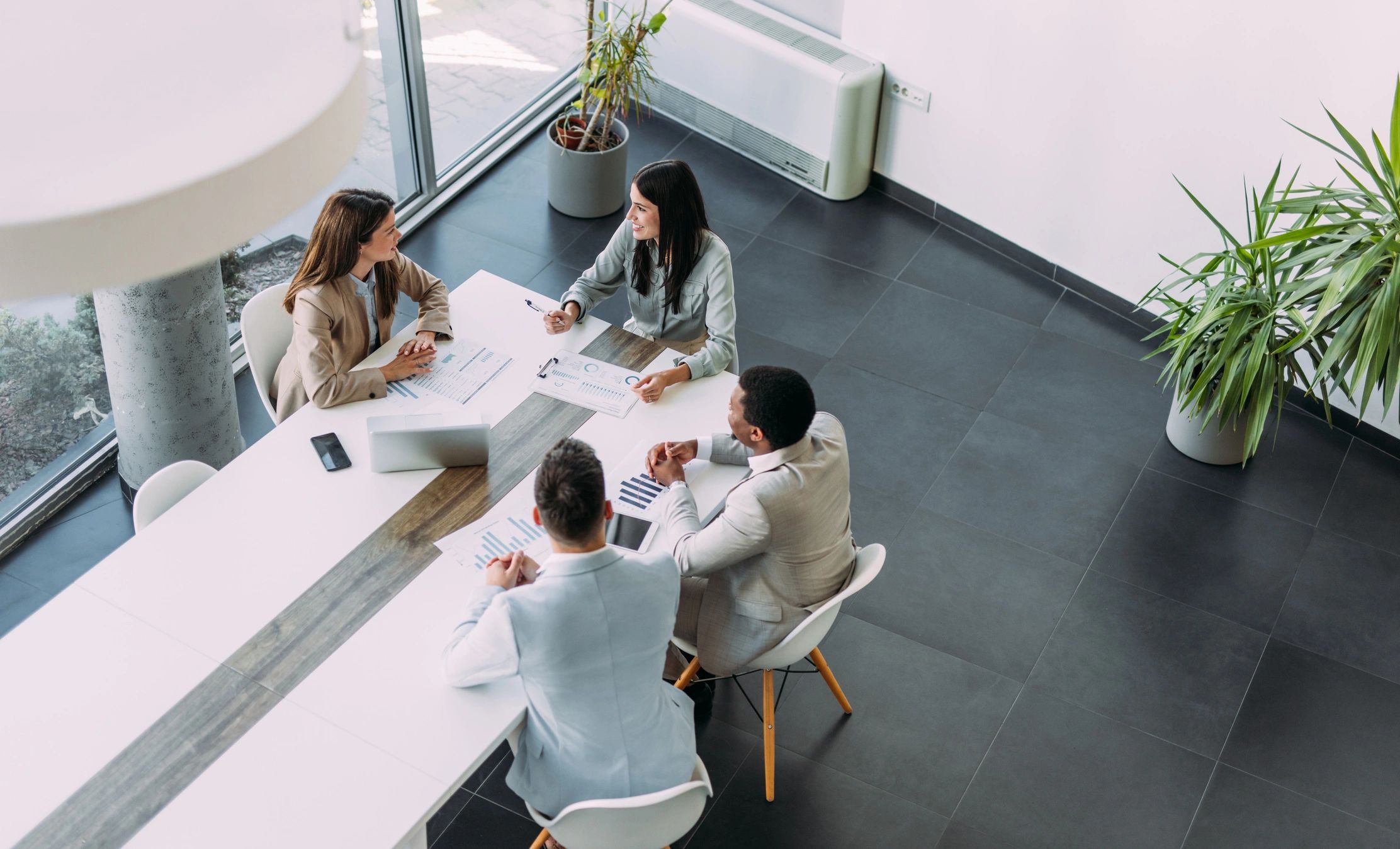 Senior leadership team collaborating in a boardroom